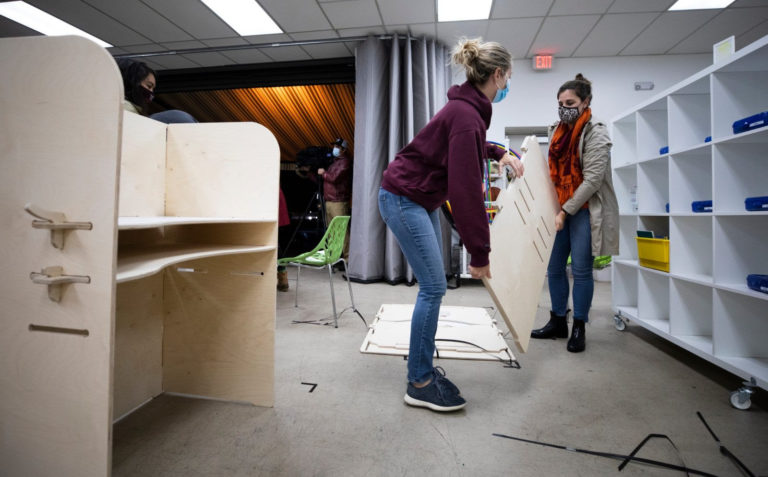Building Momentum and Virginia Tech alums build desks for local students